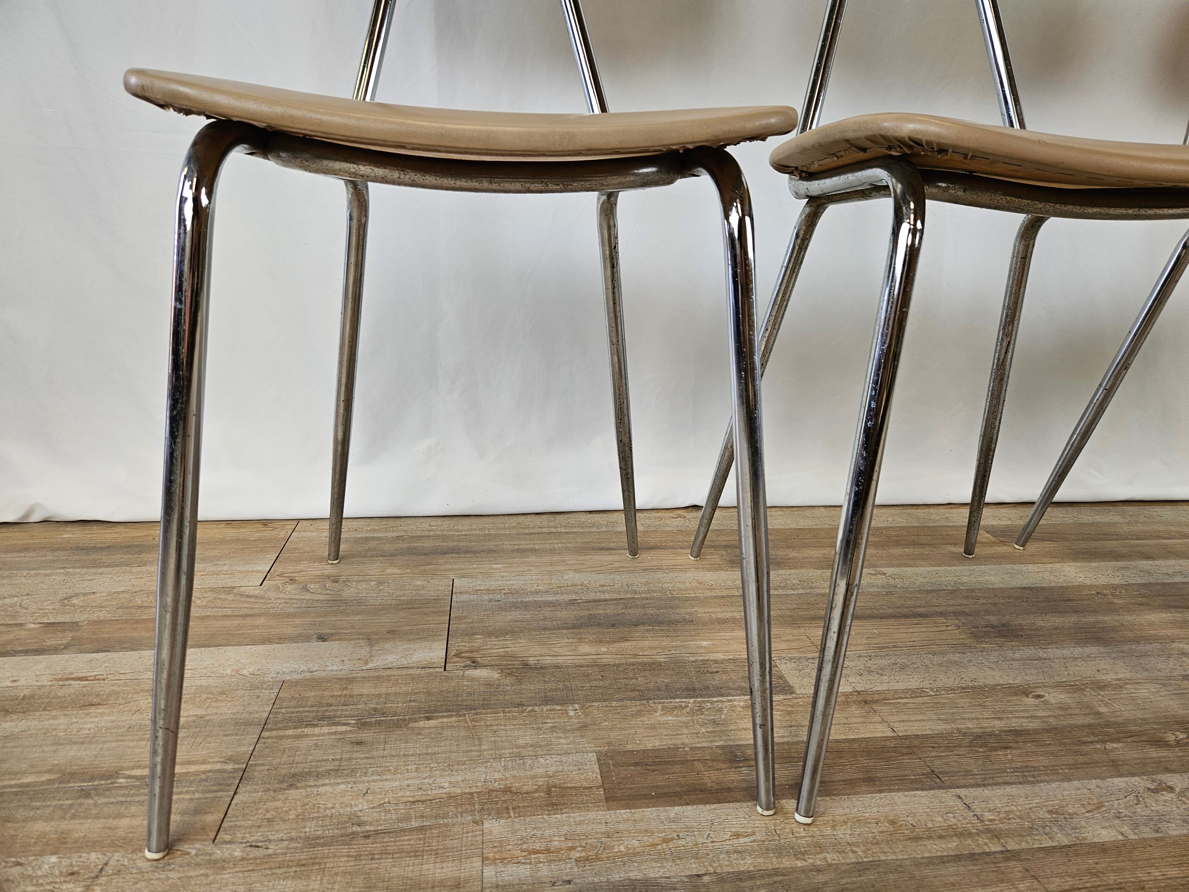 Set of four chairs in iron and skai 1970