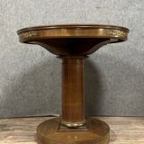 Art Deco pedestal table in mahogany and gilded bronzes around 1920