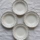 4 assiettes creuses vintage en porcelaine blanche - Motif pois bleus