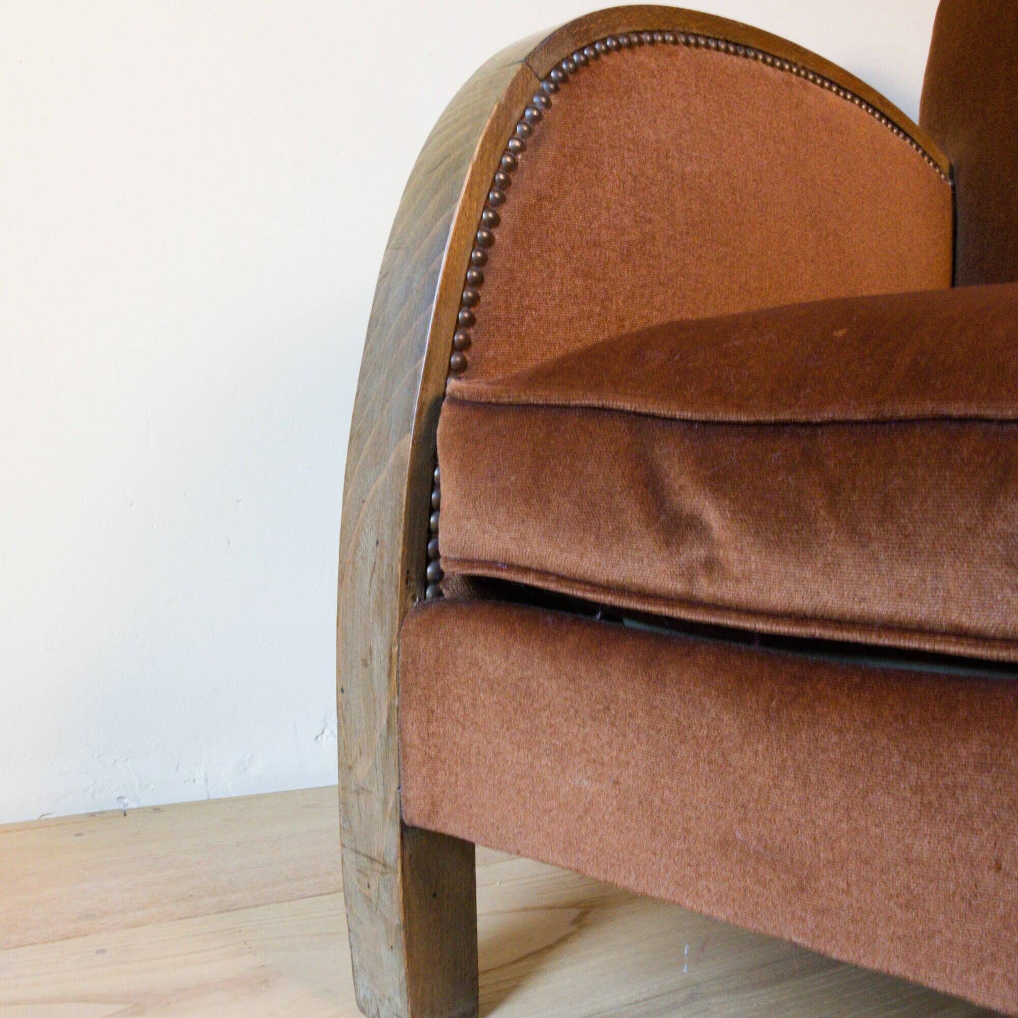 Art Deco club armchair in wood and rust brown velvet, circa 1930.