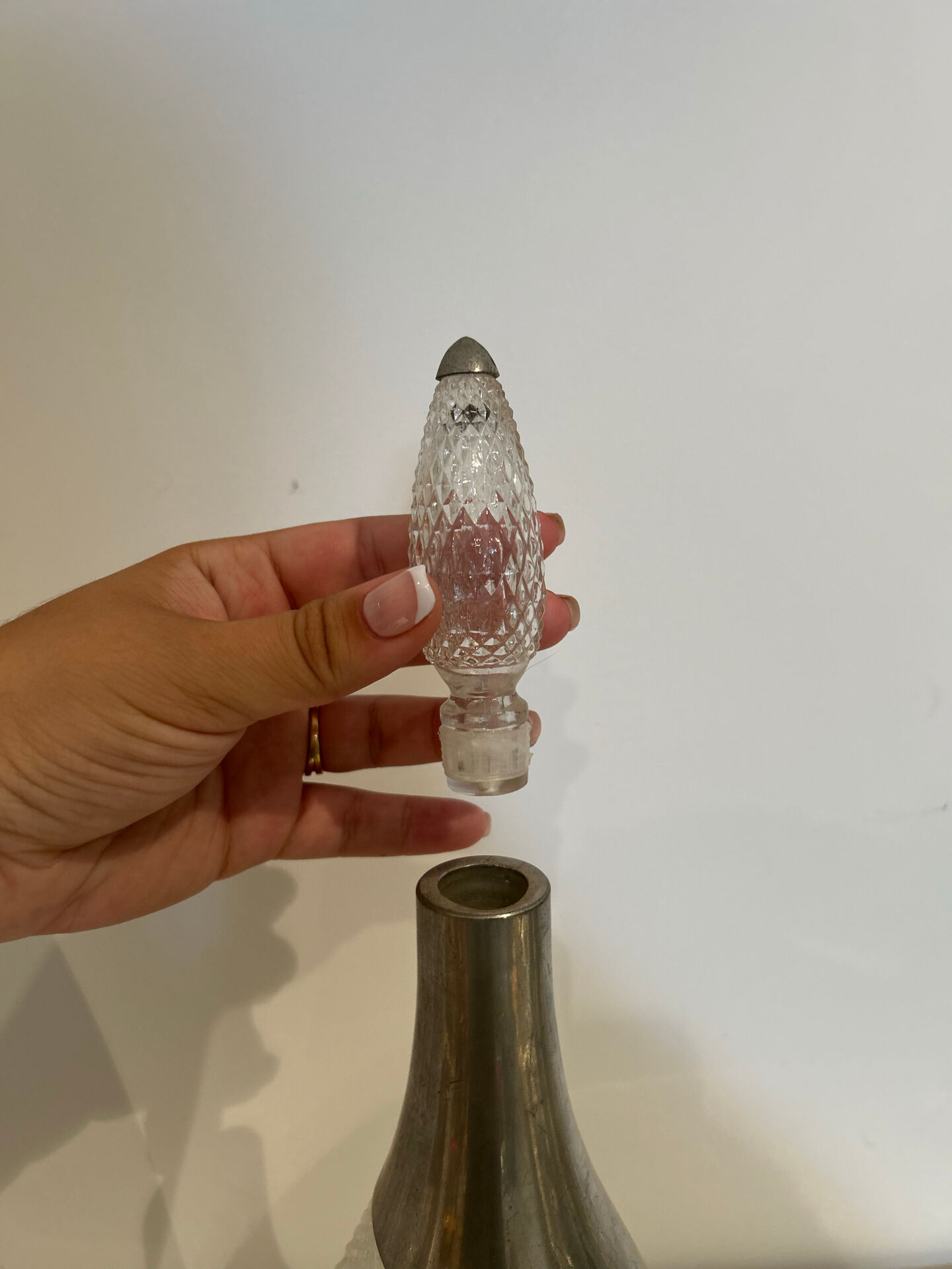 Cut glass carafe and pewter