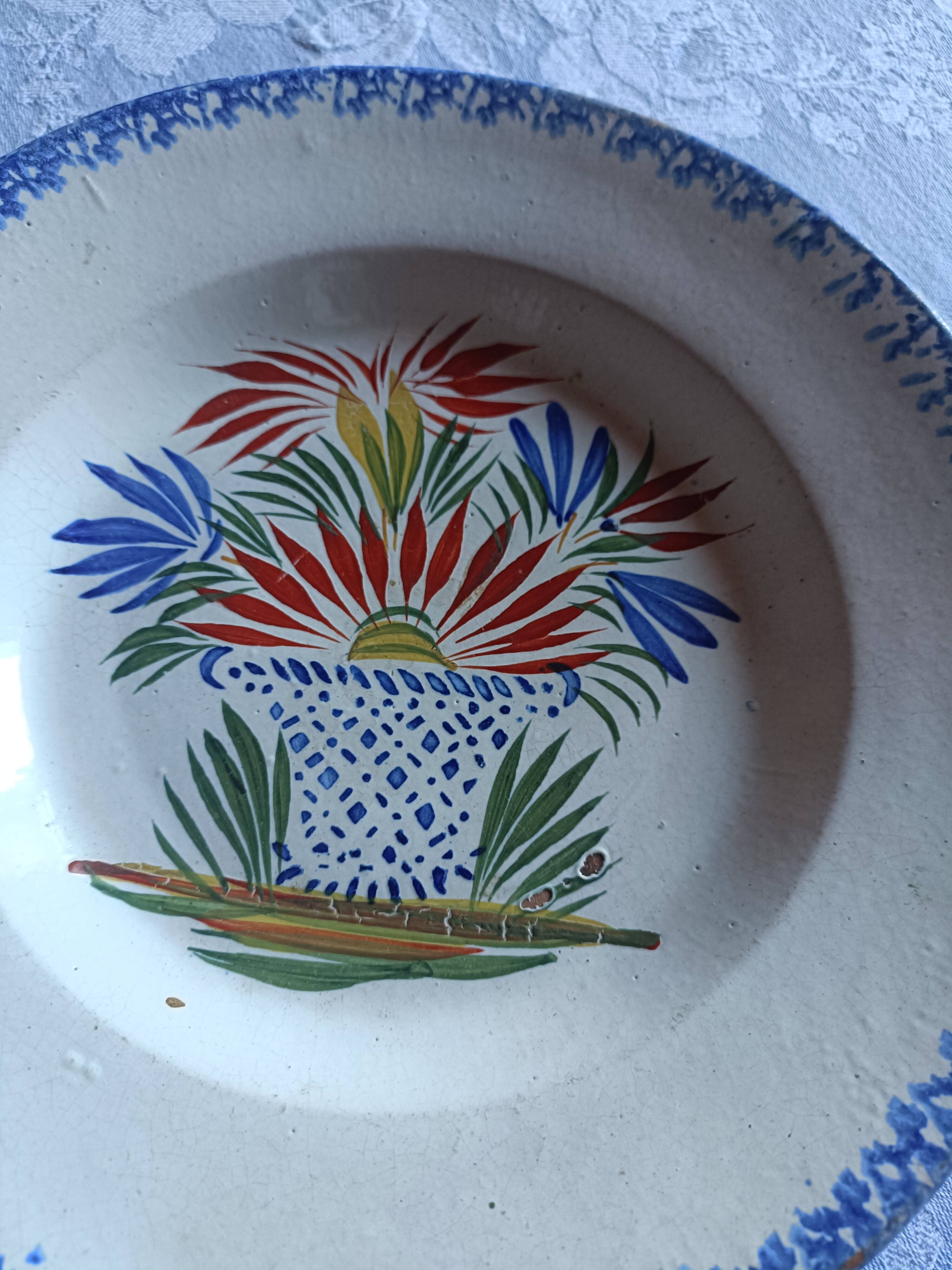 Two 19th-century plates in earthenware.