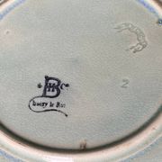 Antique plate from the Choisy Le Roi collection in slip with foliage and flowers