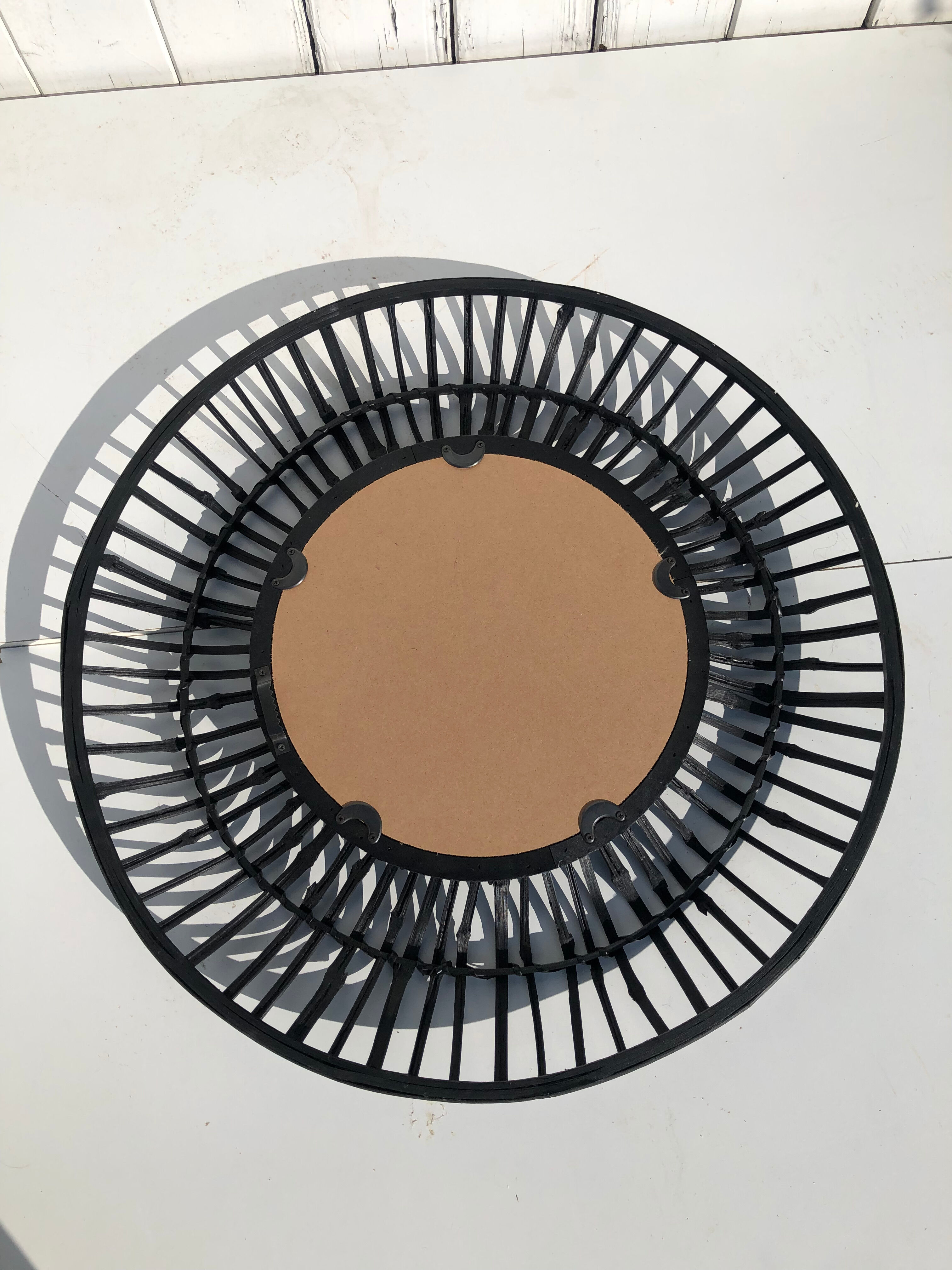 Round black rattan mirror