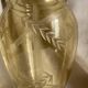 Amber vase with engraved decoration