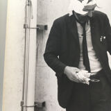 90s photo print: wounded man