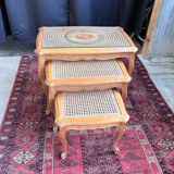 Vintage nesting tables in wood and cane – perfect condition.