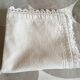 A handmade lace cushion cover