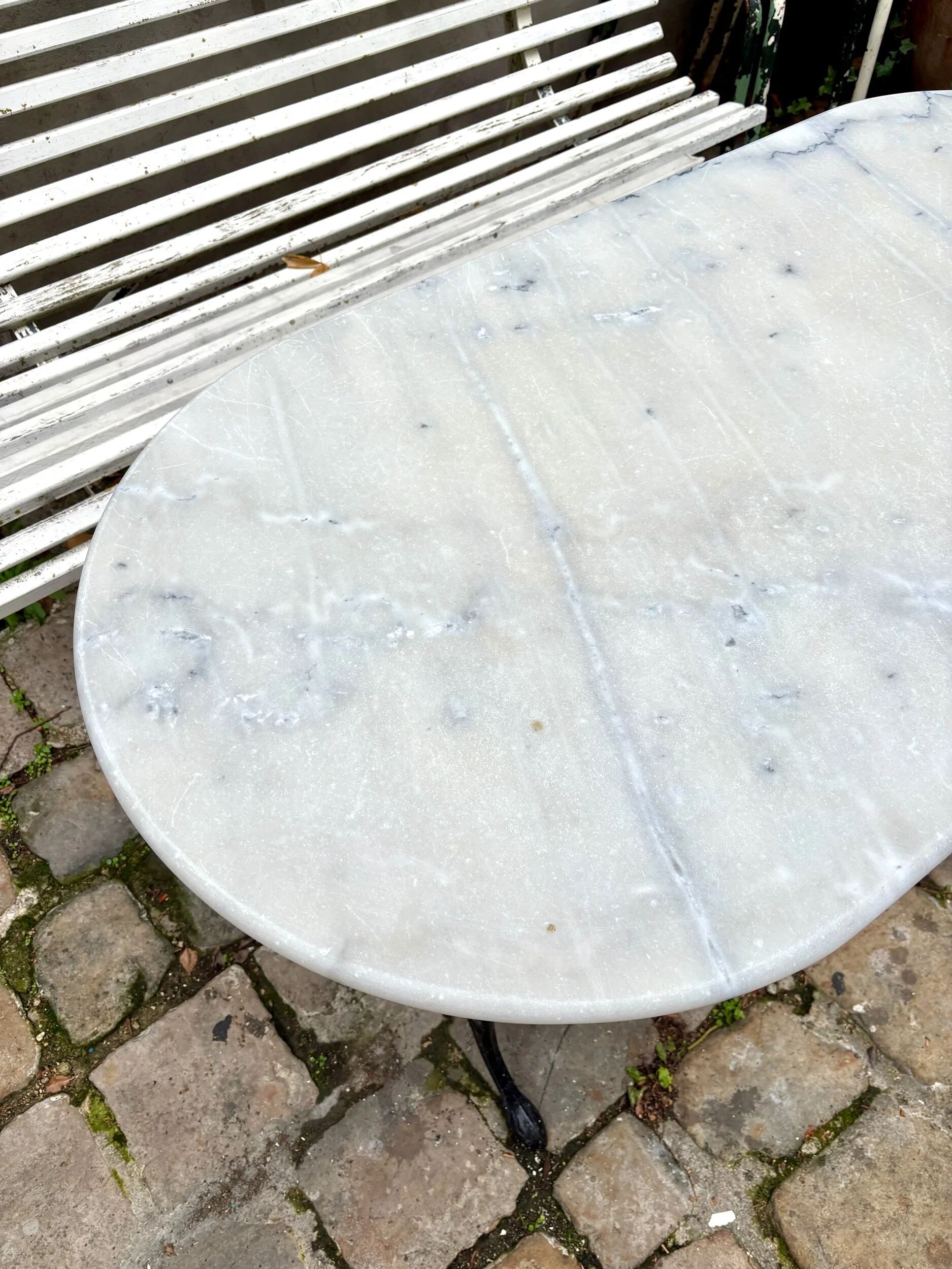 Oblong bistro table in grey marble and black cast iron