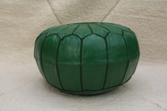 Moroccan pouf in green leather