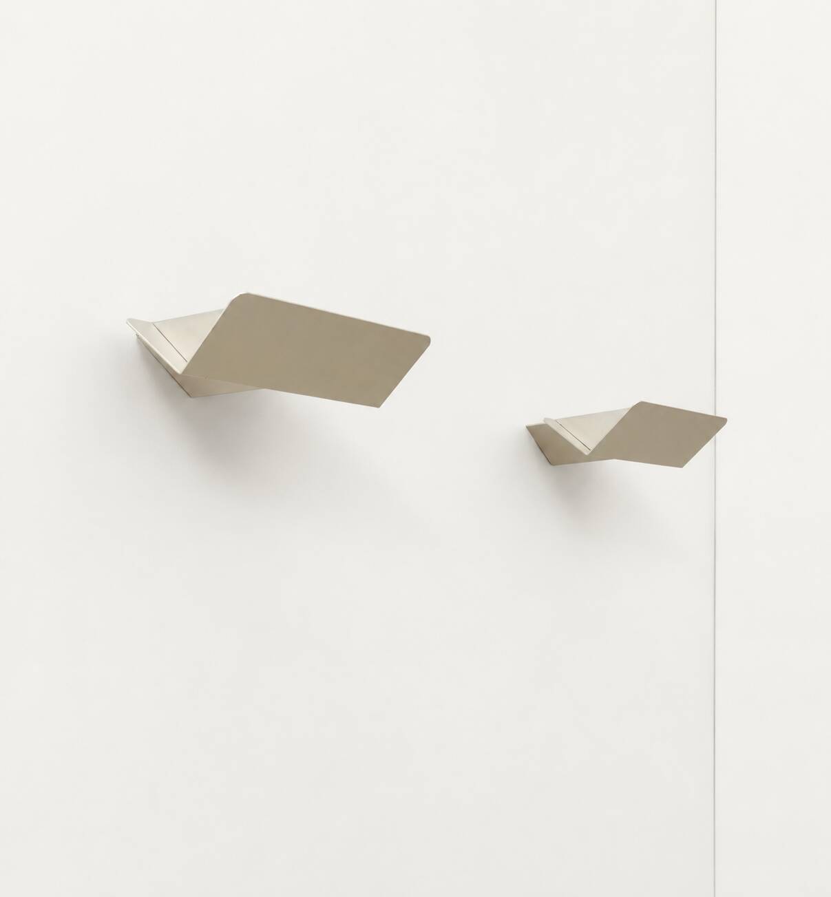 Pair of vintage wall sconces, matte white metal, France, 1970.