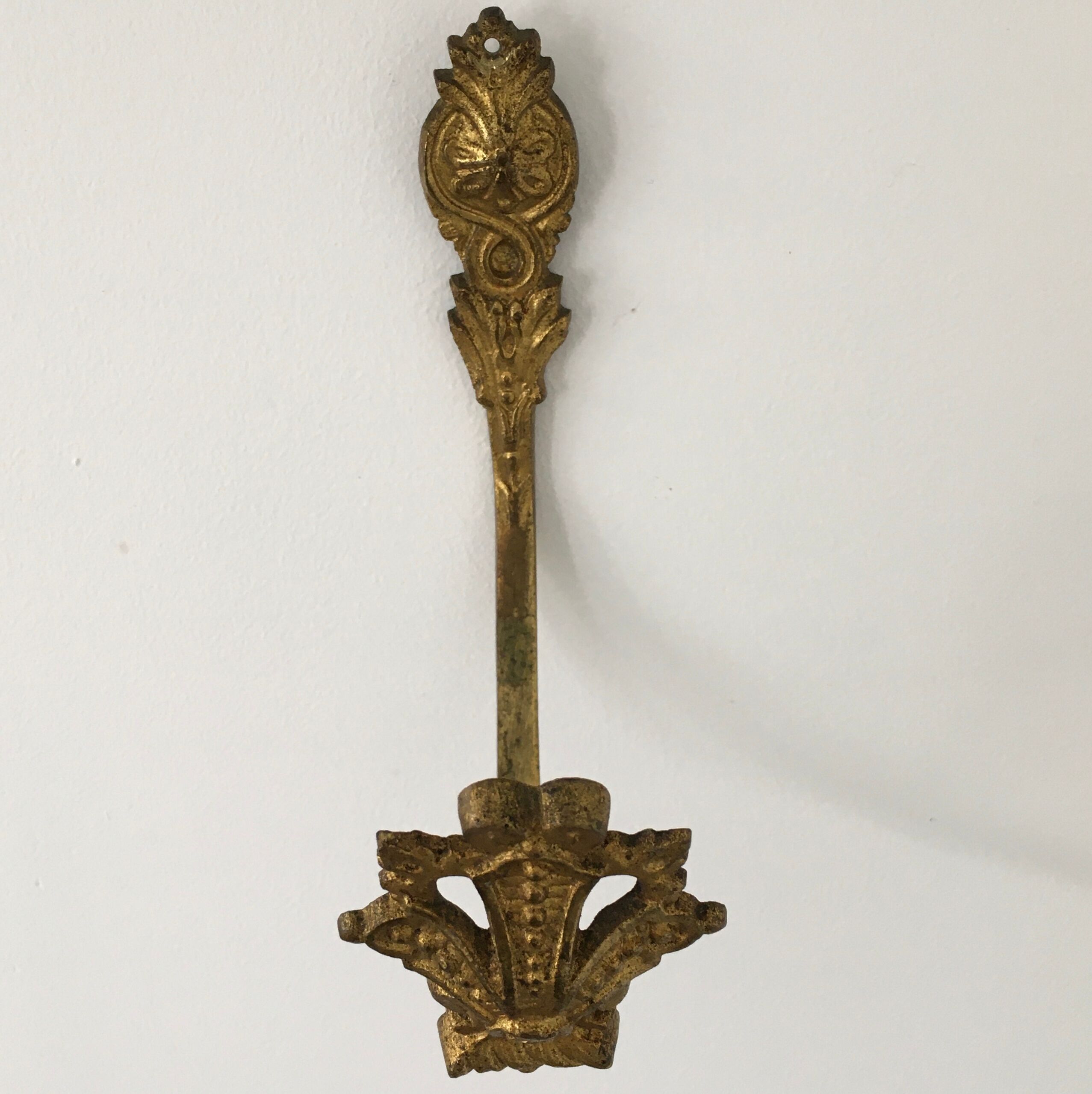 Golden brass patère