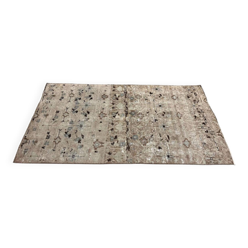 Tapis ancien unique au design aztèque, turc ancien en teintes atténuées.
