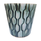 Pot cover with geometric decoration