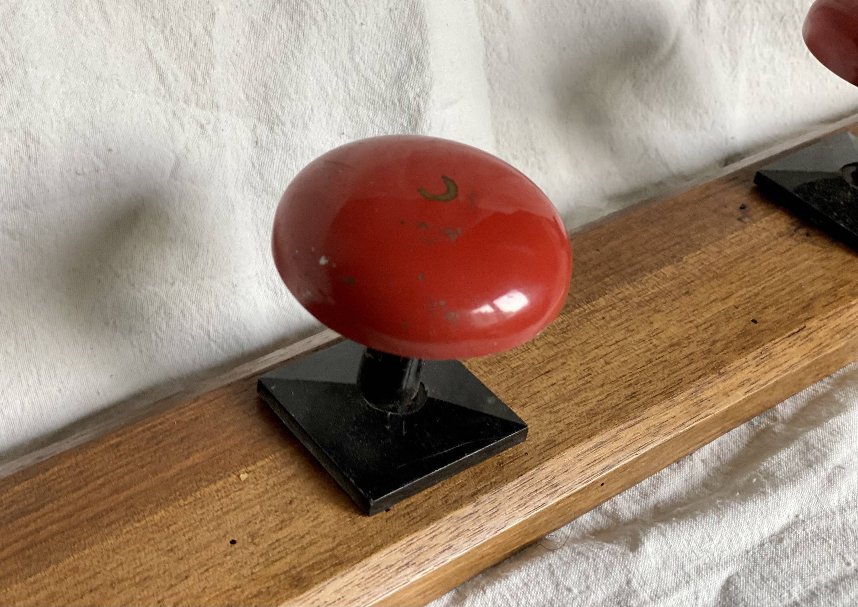 Wall-mounted coat rack with 3 hooks, vintage 1960s red lacquered metal.