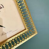 Antique gilt metal frame with flower engraving