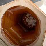 Column wears vintage plant