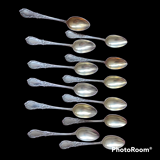 12 teaspoons in silver metal