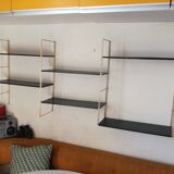 Gold and black thong shelf