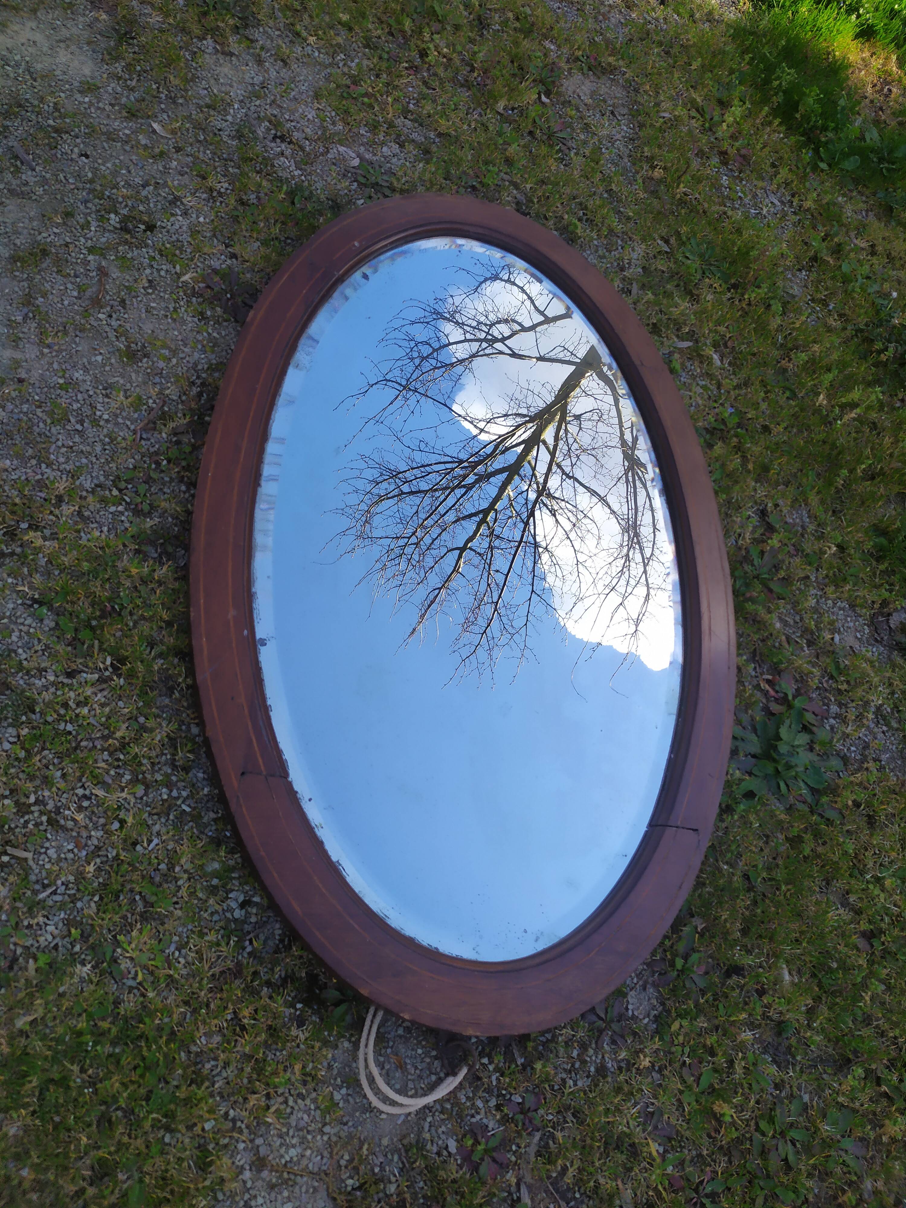 Beveled oval mirror 83x52cm