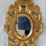 Pair of  baroque mirrors in gilded wood