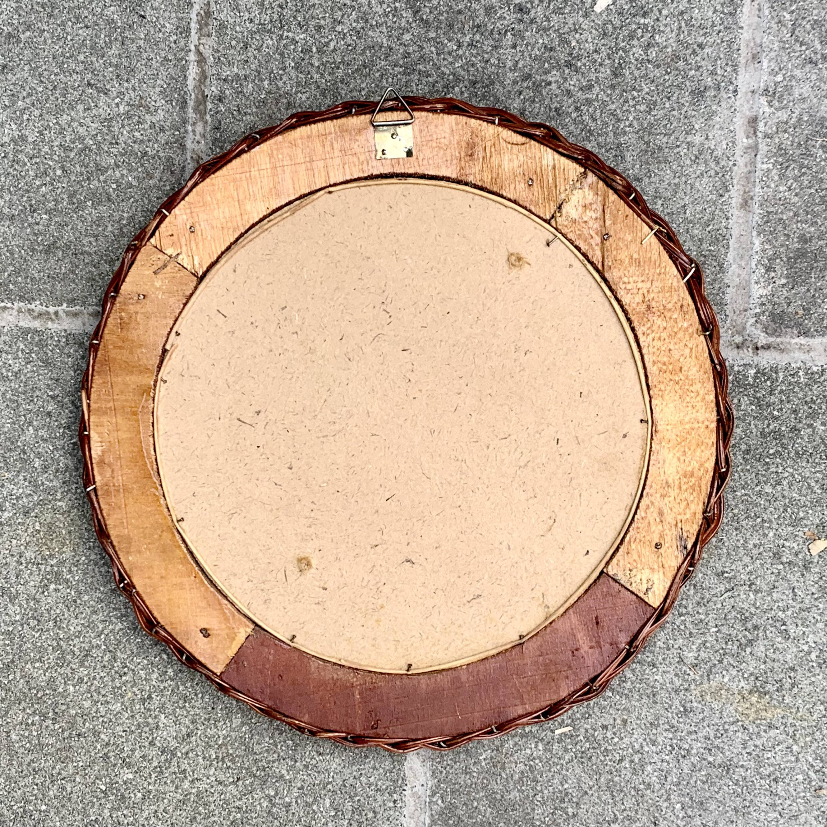 Vintage round woven rattan wall mirror