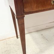 Louis XVI style desk in mahogany and veneer, 20th century.