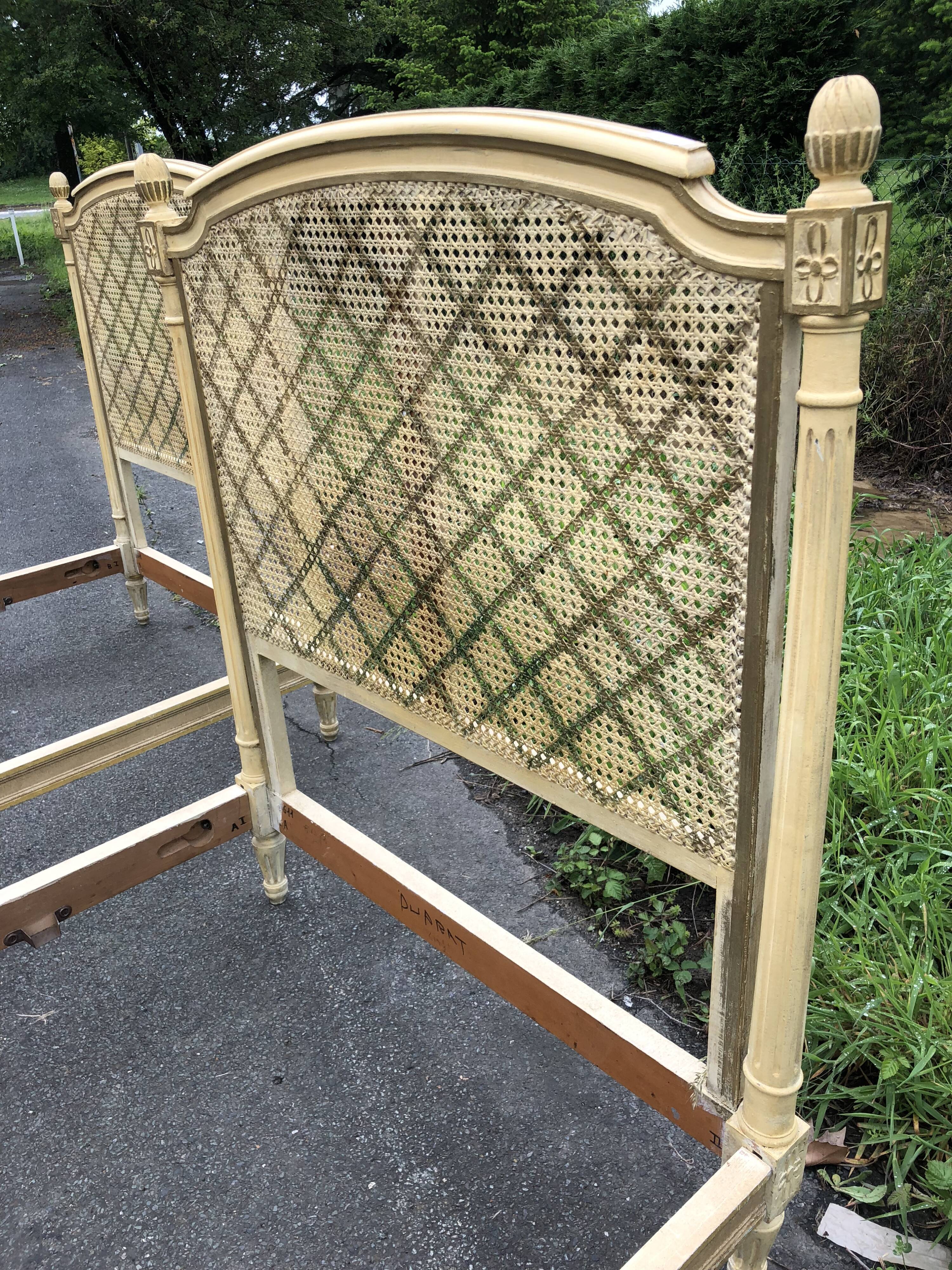 Pair of twin bed Louis XVI caned painted patinated