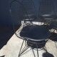 Set of 4 Eames chairs in metal