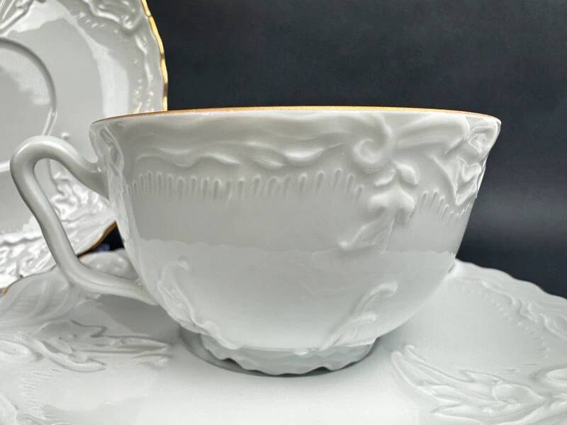 Tharaud Limoges white porcelain cups and saucers with gold relief