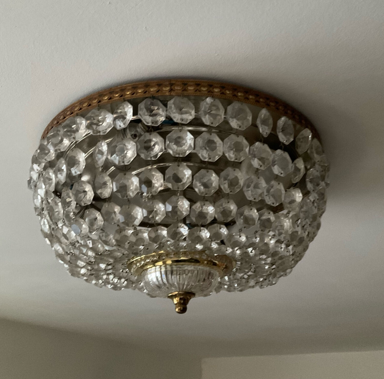 Vintage ceiling light with pendants and brass.