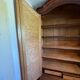 Glass-fronted lingerie wardrobe in solid wood