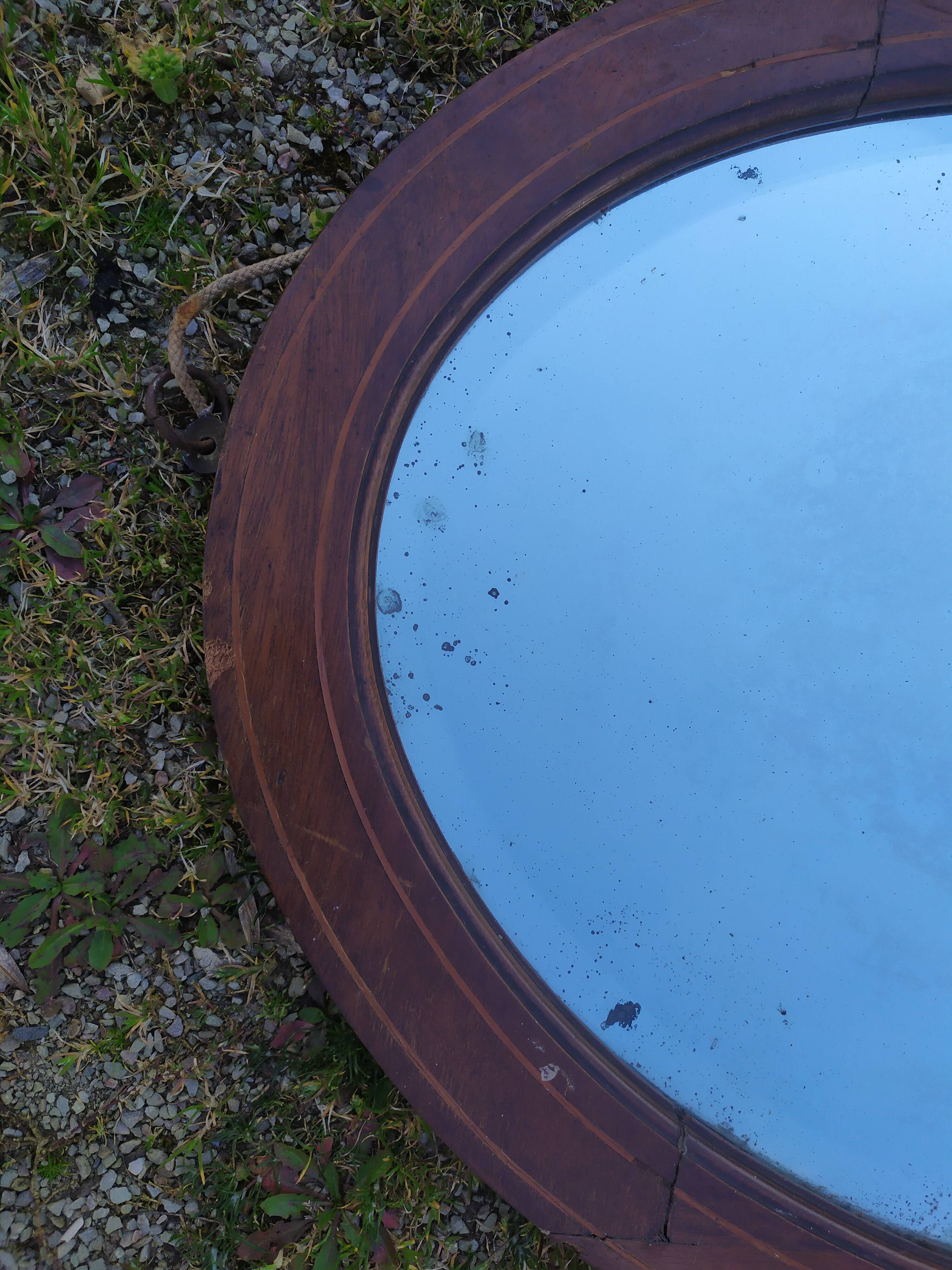 Beveled oval mirror 83x52cm