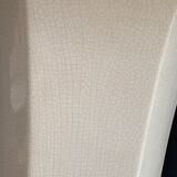 Column wears vintage plant