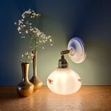 Vintage globe wall sconce in white opaline glass with floral decorations