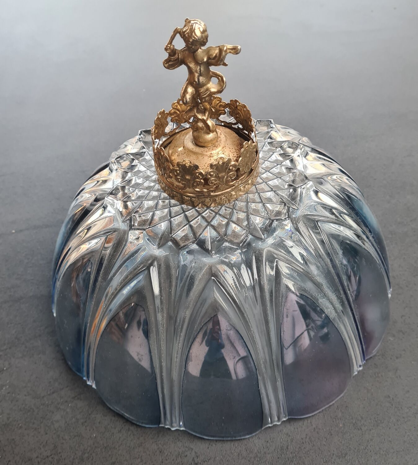 Glass lampshade with brass angel