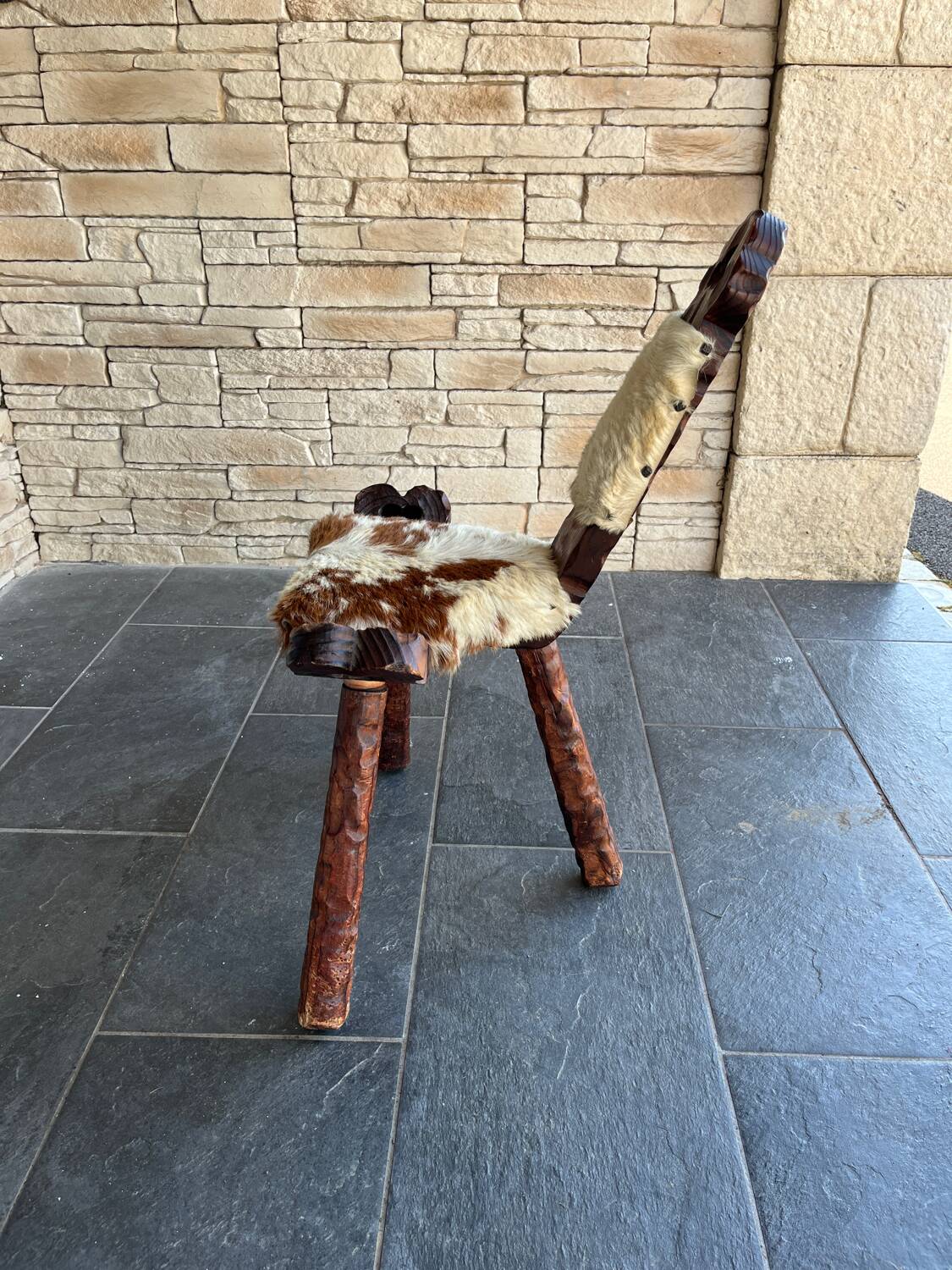 Vintage brutalist tripod chair in wood and leather