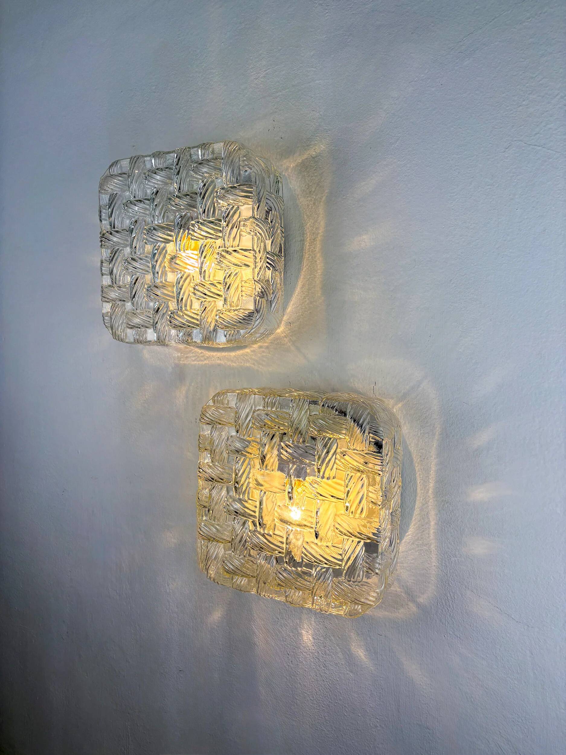 Pair of woven textured glass wall lights by Leuchten, Germany, 1970s