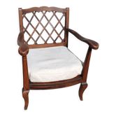 Fauteuil dossier a croisillons