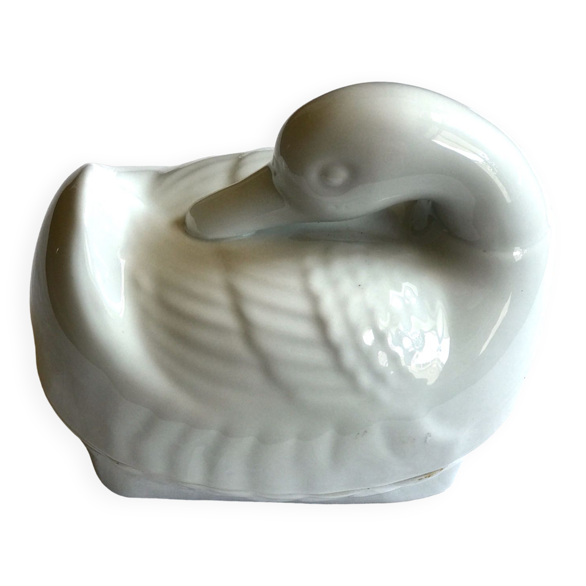 Porcelain duck dish with lid on fire