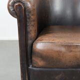 Characterful club armchair made of sheepskin with a beautiful patina