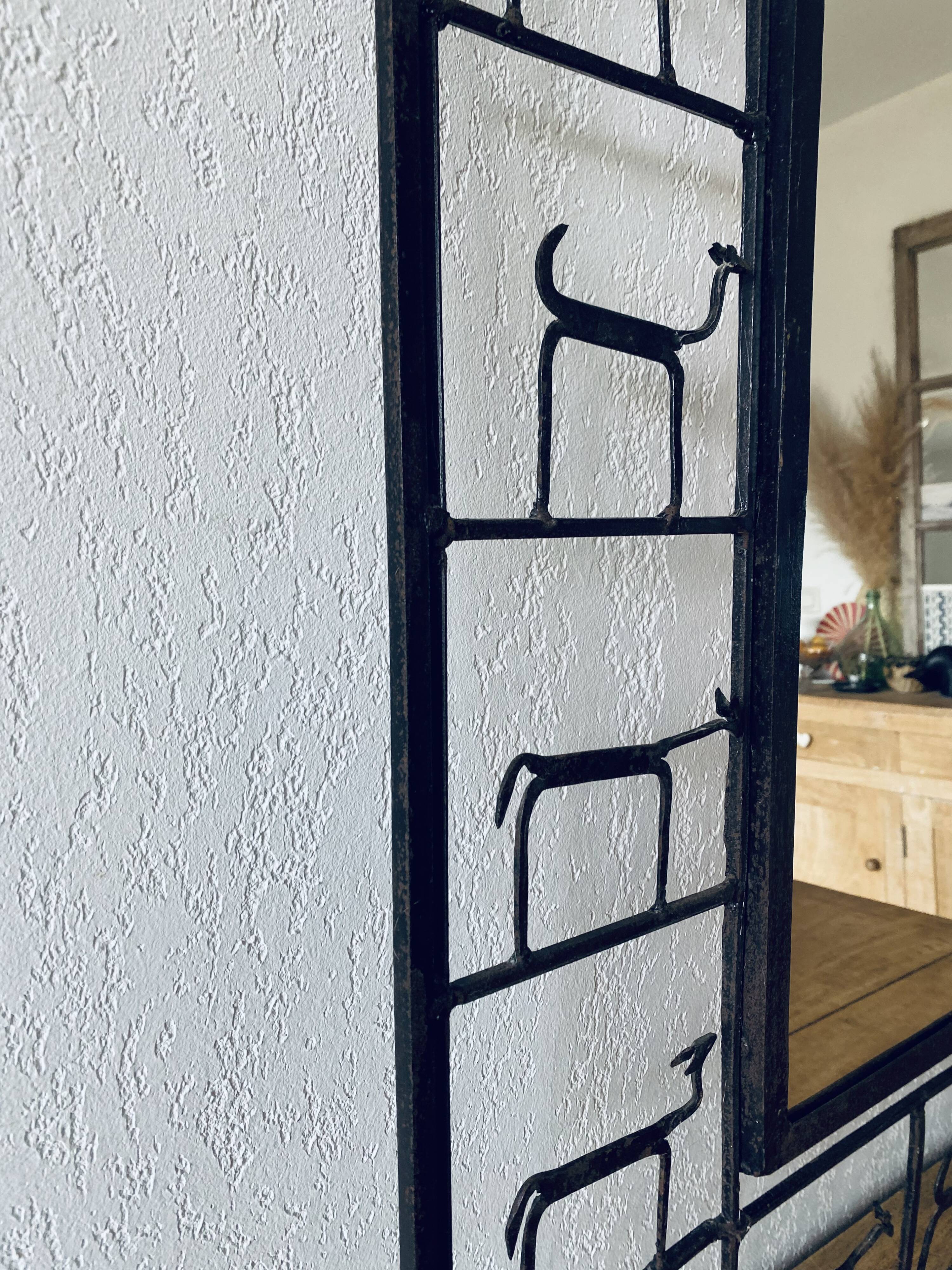 Mirror in ironwork of art