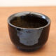 Set of 8 black ceramic cups signed