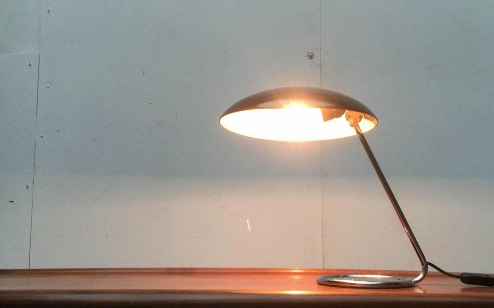 Metal table lamp model 6761 from the mid-century German period by Christian Dell for Kaiser Leuchten, 1960s.