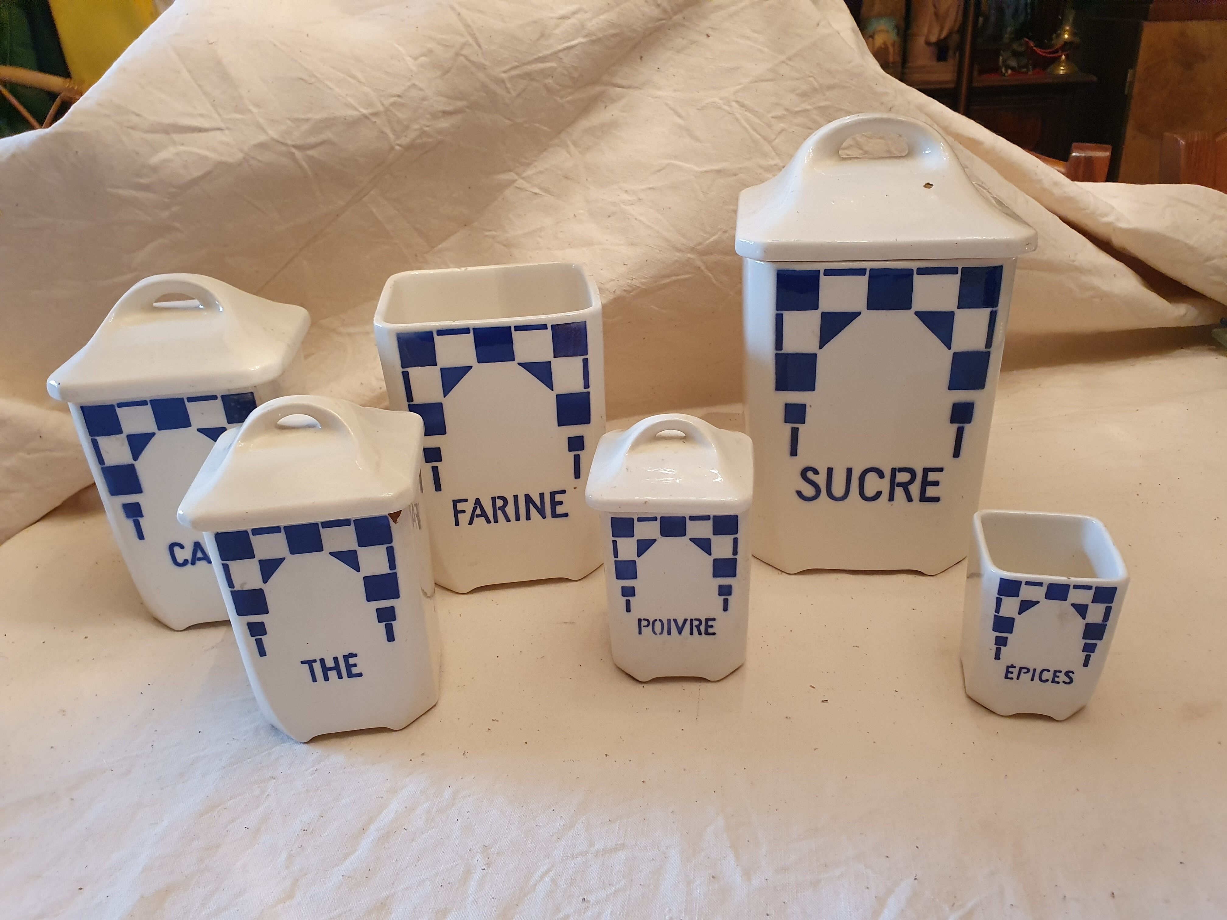 6 blue checkered jars