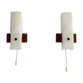 Mid-century wall lights in white plexiglass with a wooden base, 1960s, Germany.