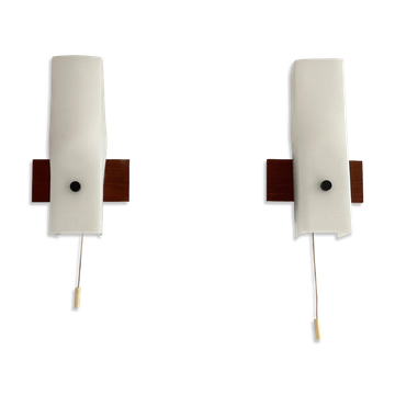 Mid-century wall lights in white plexiglass with a wooden base, 1960s, Germany.