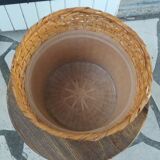 Under wicker pot