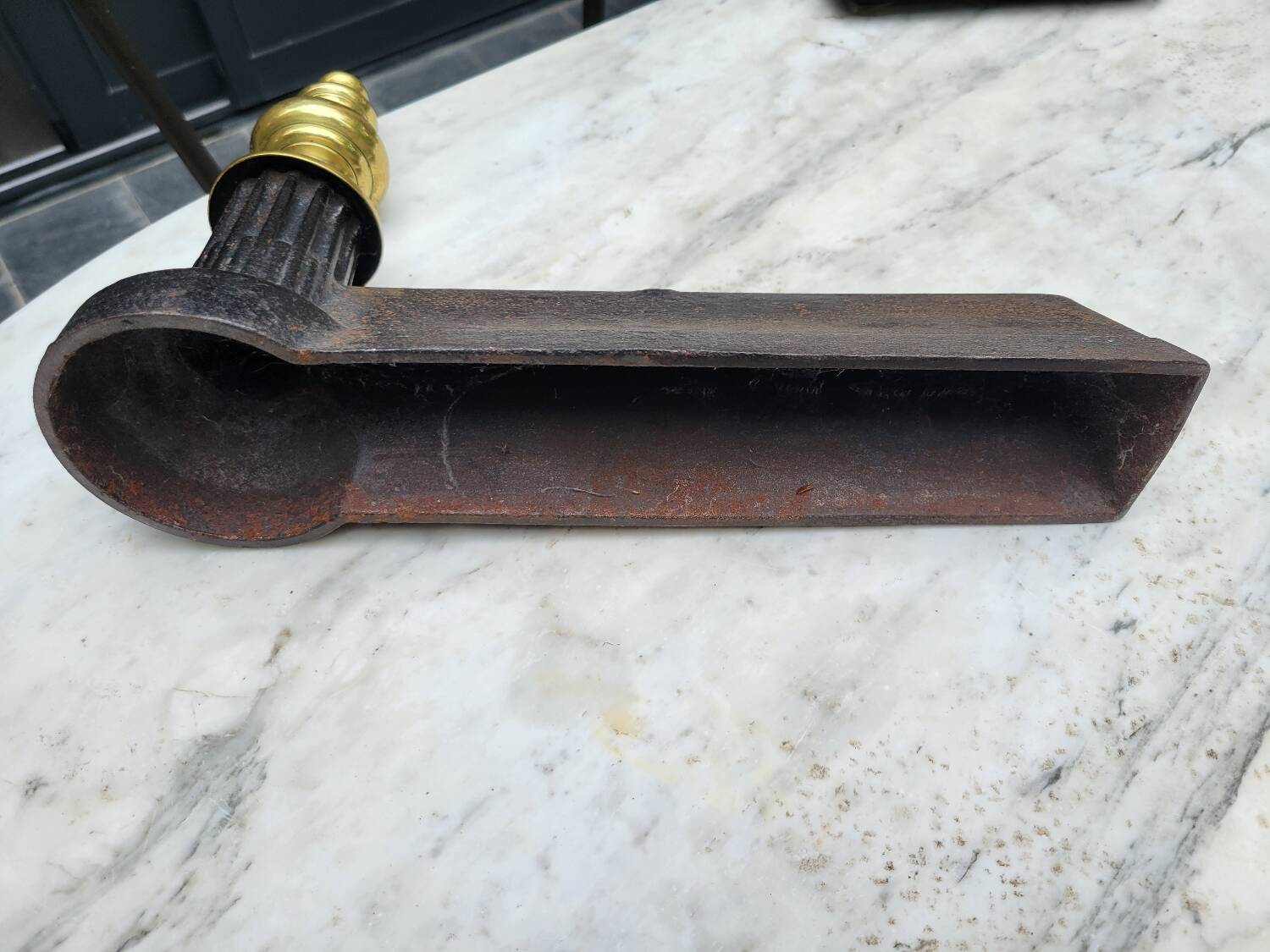 Paire de chenets en fonte et laiton
