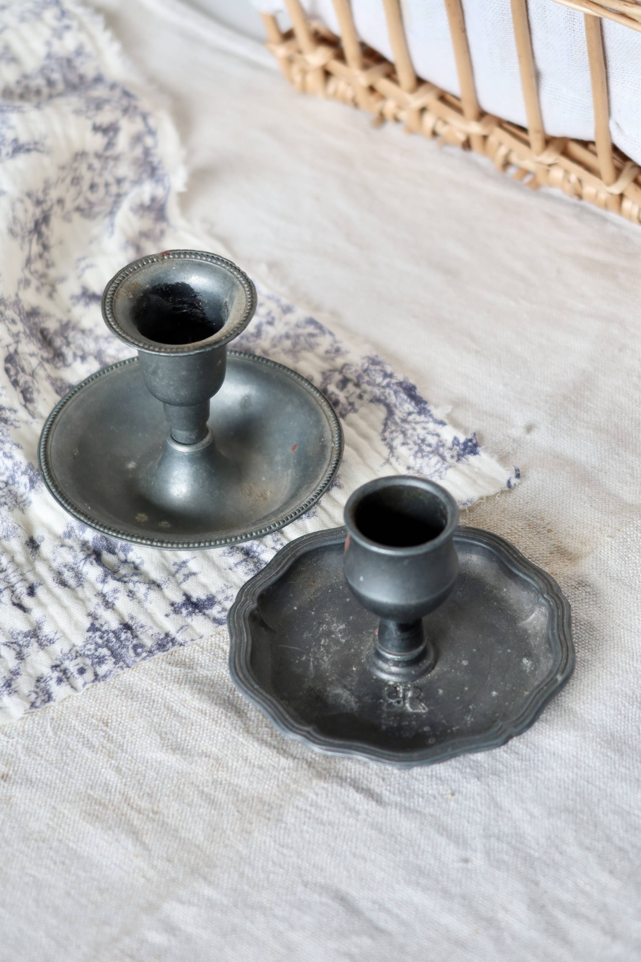 Pair of mismatched vintage silver-plated candlesticks